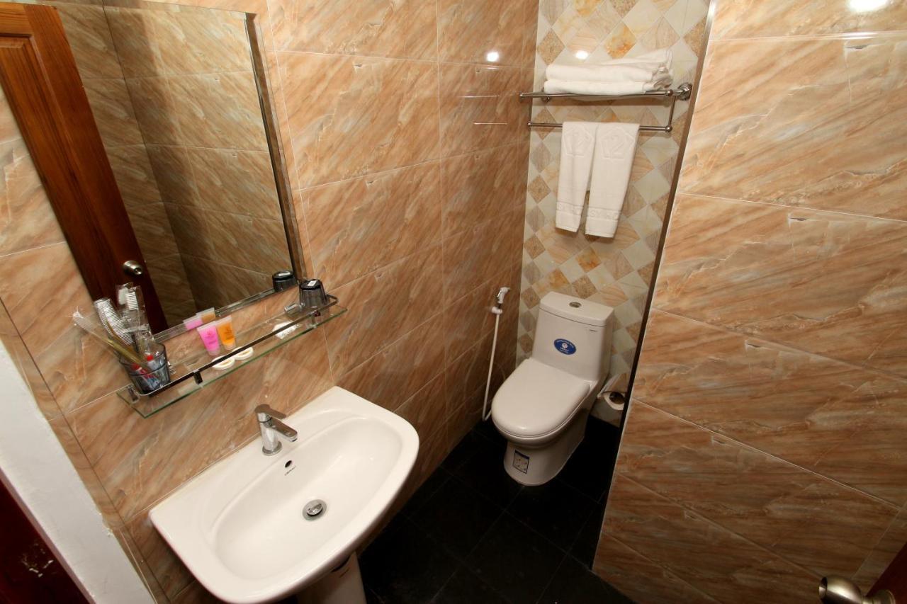 Gemsy Hotel Rangoon Værelse billede